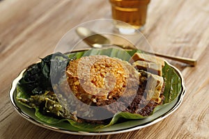 Nasi Padang, originated from Indonesia. Rice with beef Rendang, cassava leaves, Gulai Nangka, and Sambal