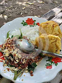 nasi pecel traditional food in Indonesia photo