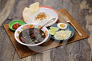 nasi rawon, Indonesian black beef soup with rice.