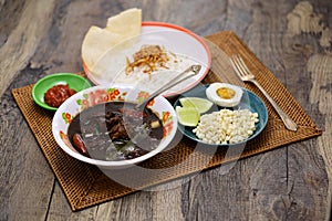 nasi rawon, Indonesian black beef soup with rice. photo