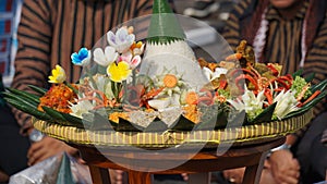 Nasi tumpeng (cone rice) served with urap-urap (Indonesian salad), fried chicken and noodles