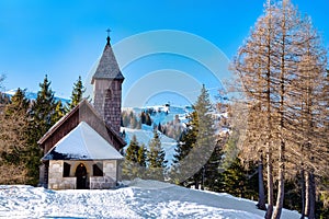 Nassfeld Kirche Nassfeld church on a small hill in Nassfeld, Austria