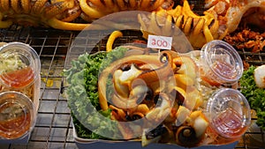 National Asian Exotic ready to eat seafood at night street market food court in Thailand. Delicious Grilled Prawns or Shrimps and