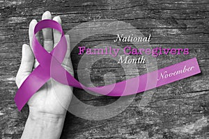 National family caregivers month in November with plum purple ribbon awareness