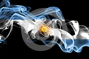 National flag of Argentina made from colored smoke isolated on black background. Abstract silky wave background