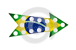 National flag of Brazil painted over a vintage bright and colorful illuminated metallic display arrow sign