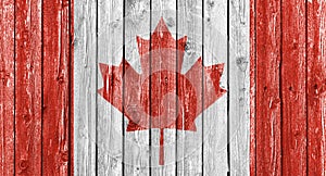 National flag of Canada on old white wood background