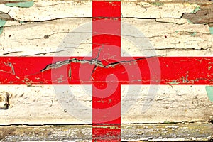 National flag of England painted on an old wooden surface
