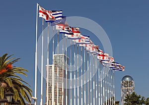 National flag of Georgia against the blue sky.