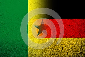 The national flag of Germany with The Republic of Senegal National flag. Grunge background