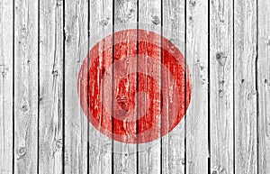 National flag of Japan on old wood background