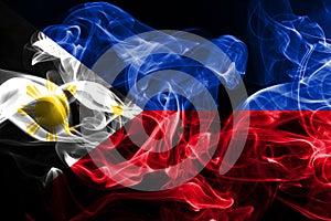 National flag of Philippines made from colored smoke isolated on black background