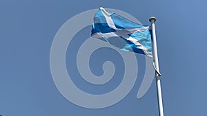 National flag of Scotland isolated on clear blue sky