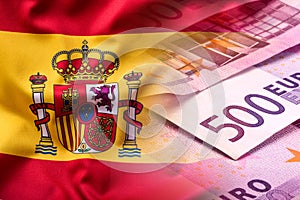 National flag of spain and euro banknote - concept. Euro coins. Euro money. Euro currency
