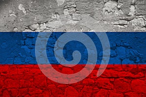 National flag of the state of Russia on an old stone wall with cracks, the concept of tourism, emigration, economy, politics,