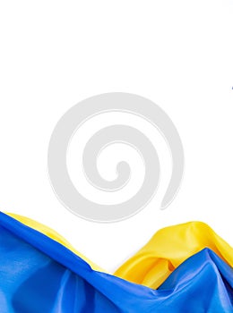 National flag of Ukraine. Fabric curved in yellow-blue colours ribbons on white background. National symbol of country. Europe.