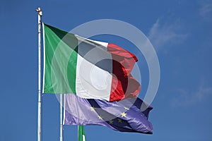 National flags of Italy and European Union.