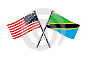 national flags of United Republic of Tanzania and Usa crossed on the sticks