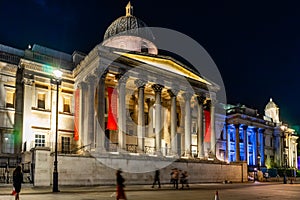 The National Gallery, Trafalgar Square at night in London, England, UK