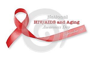 National HIV/AIDS and aging awareness day, September 18 with red ribbon isolated with clipping path