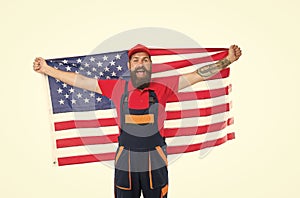 National holiday. Worker celebrate independence day. Work visa USA. Man hold american flag. Repair and renovation. Guy