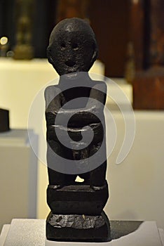 National museum of Anthropology bulul carved wooden figure in Manila, Philippines