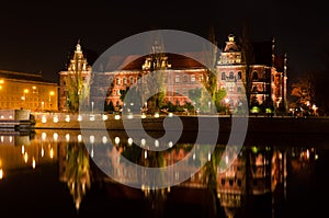 National Museum, Muzeum Narodowe, of Wroclaw shoted in the evening and its reflection in Odra river