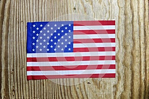 national textile flag on wooden table