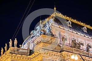 National Theater in Prague illuminated in the evening photo