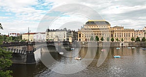 National Theatre located in Prague, Czech Republic on the Vltava River. Flight over the Prague, old town, Castle and