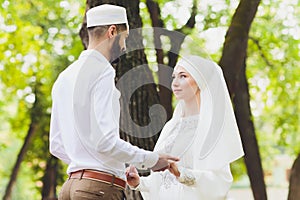 National wedding. Bride and groom. Wedding muslim couple during the marriage ceremony. Muslim marriage.