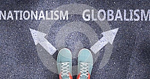 Nationalism and globalism as different choices in life - pictured as words Nationalism, globalism on a road to symbolize making