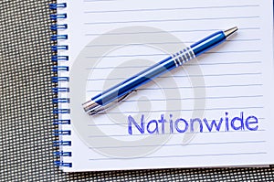 Nationwide write on notebook