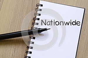 Nationwide write on notebook