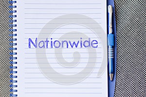 Nationwide write on notebook