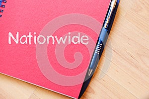 Nationwide write on notebook