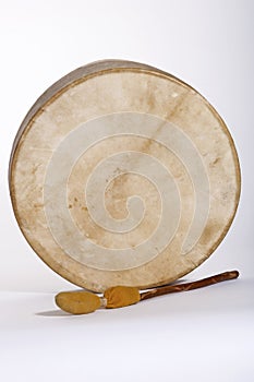 Native American Indian Deerskin Drum and Drumstick photo