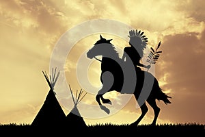 Native American Indian on horseback at sunset