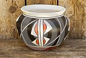 Native American Indian pottery on wood shelf