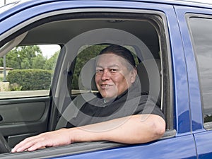 Native American man in his car