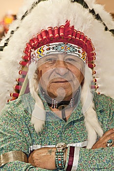 Native American Man wearing Authentic Headdress