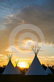 Native American Tepees on the Prairies at Sunset