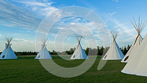 Native American Tepees on the Prairies at Sunset