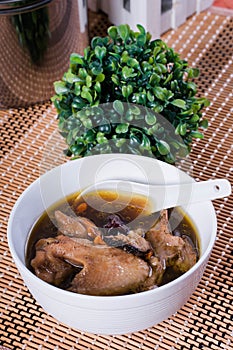 Native chicken with sibut or Chinese four herbs soup