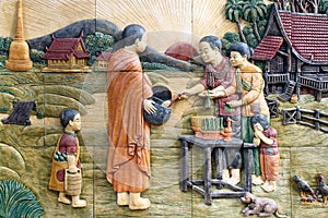 Native culture Thai stucco on the temple wall photo