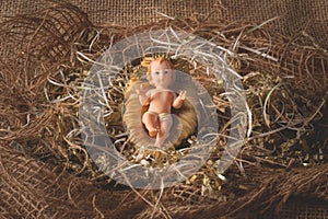 Nativity scene. Baby Jesus figure isolated. traditional christmas scene