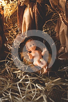 Nativity scene. Baby Jesus figure isolated. traditional christmas scene