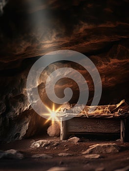 Nativity scene with baby Jesus lying in manger, surrounded by rocks and shining light. The baby is positioned on top of