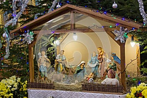 Nativity scene in the church,Christmas Manger scene with figurines including Jesus, Mary, Joseph, sheep and magi