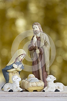 Nativity Scene on Golden Background with Copy Space